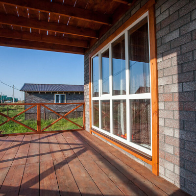 Фaсадная плитка Hauberk коллекция Кирпич цвет Мраморный на фасаде дома фото 1